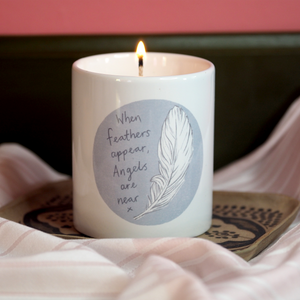Feathers appear when Angels are near Candle
